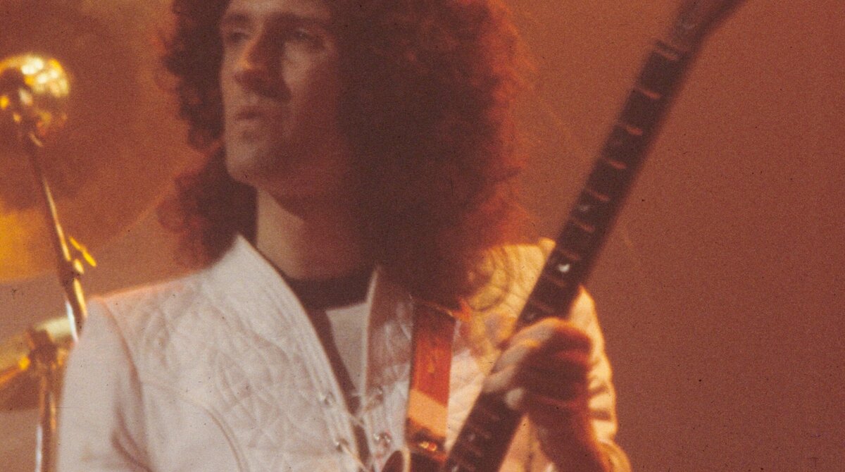 Brian May of Queen playing his homemade Red Special guitar live in November 1977