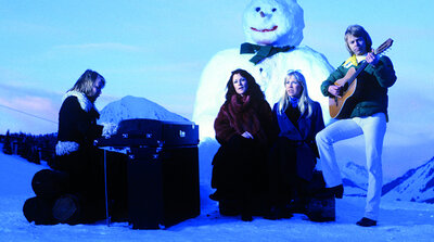 ABBA in the snow beside a large snowman, promoting Chiquitita for the 1979 Music for UNICEF Concert, the same year Gimme Gimme Gimme was recorded