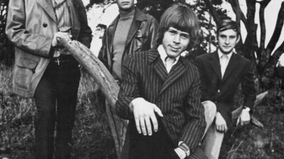 The Hootenanny Singers photographed in 1967, Bjorn Ulvaeus seated at center, the real Swedish folk group he led for a decade before ABBA existed