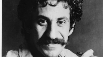 Jim Croce holding a cigar in a 1972 ABC Records publicity portrait