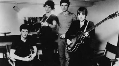 Talking Heads in a 1979 Sire Records publicity photo, showing all four band members including David Byrne and Tina Weymouth